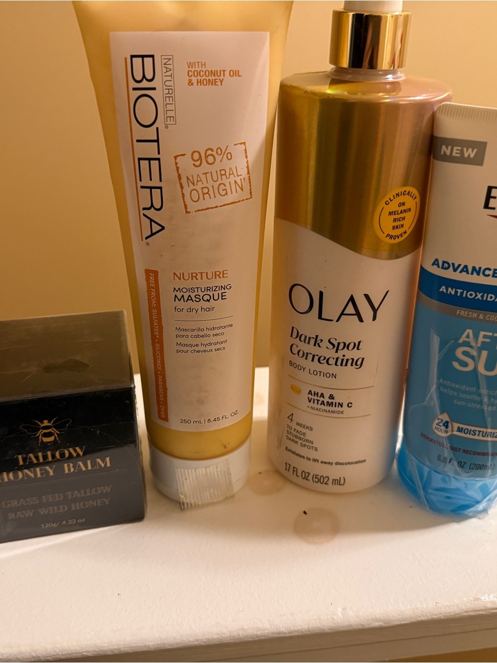 OLAY Dark Spot Correcting Body Lotion in gold and white bottle